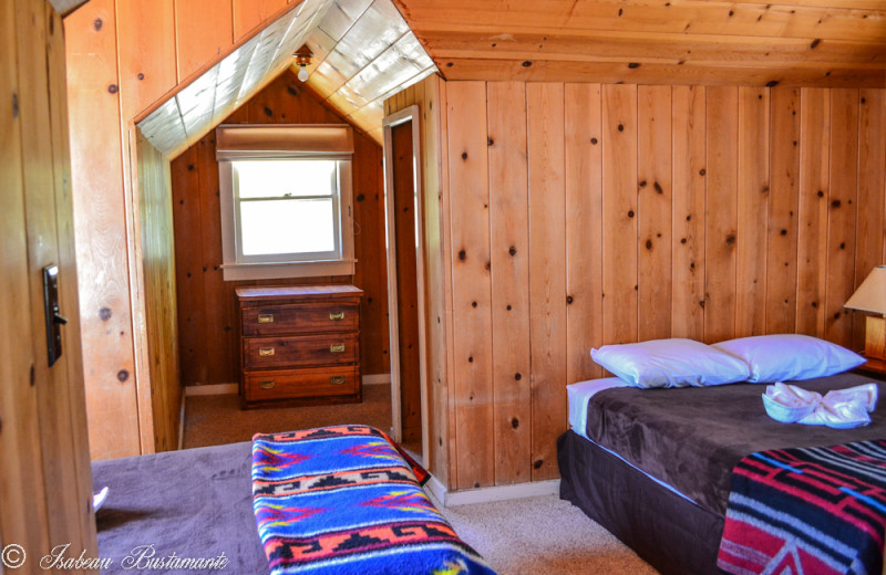 Cabin bedroom at Meeks Bay Resort & Marina.