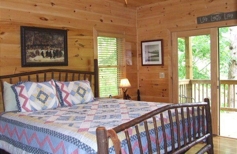 KING BED IN ONE OF THE 4 BEDROOMS AT DEER RIDGE