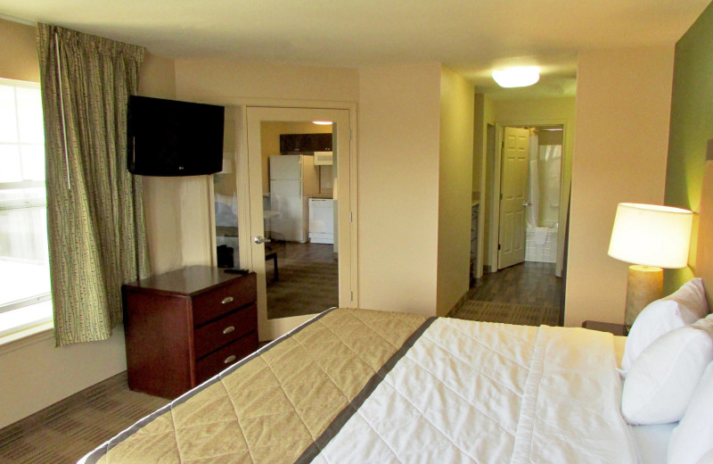 Guest room at Extended Stay Deluxe Durham - Research Triangle Park - Miami Blvd. - South.