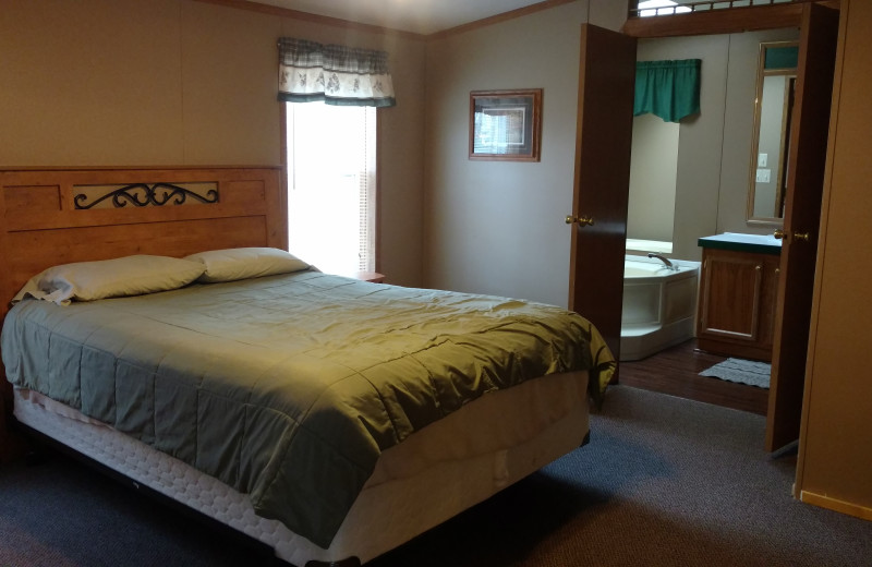 Cabin bedroom at Vacationland Resort.