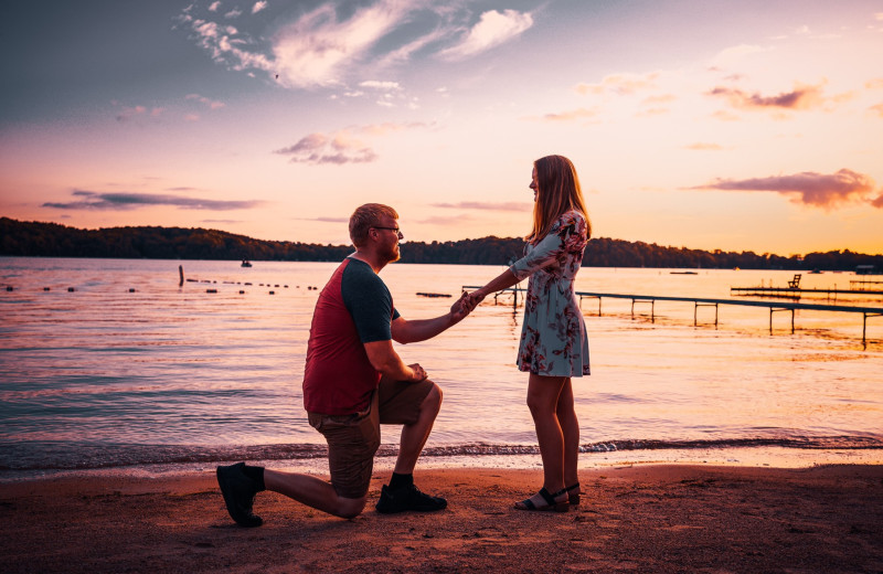 Couple proposing at The Osthoff Resort.
