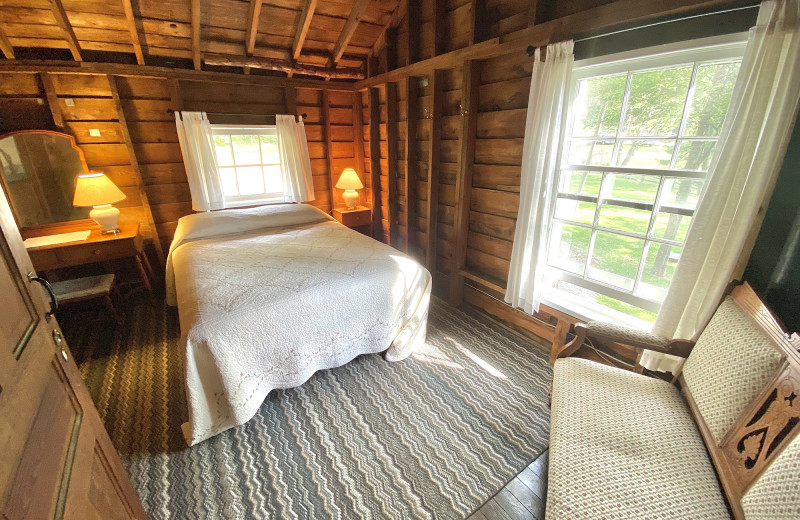 Cabin bedroom at Chimney Corners Resort.