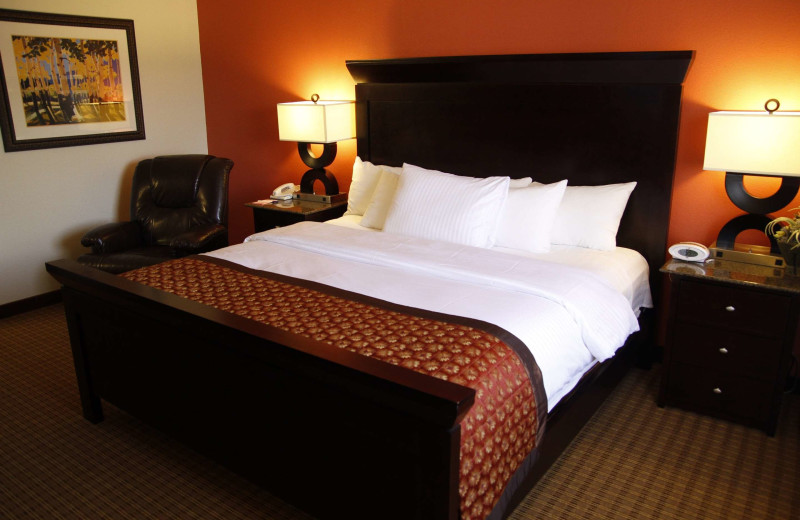 Guest room at Ramada by Wyndham Viscount Suites Tucson East.