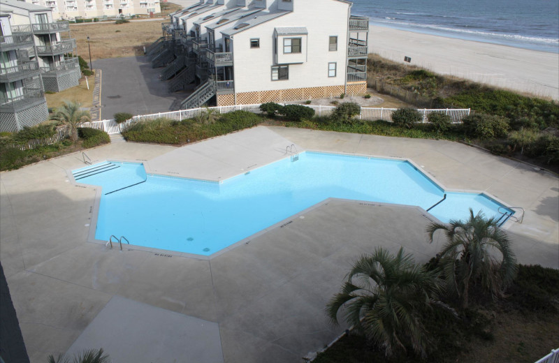 Vacation rental pool at Century 21 Action Inc.