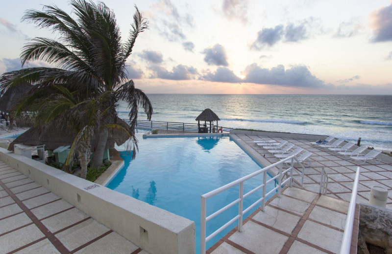 Outdoor pool at Yalmakan Cancun Hotel and Marina.