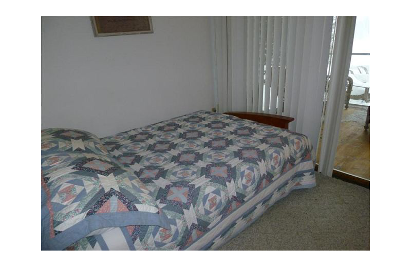 Rental bedroom At the Lakes Vacation Rentals.