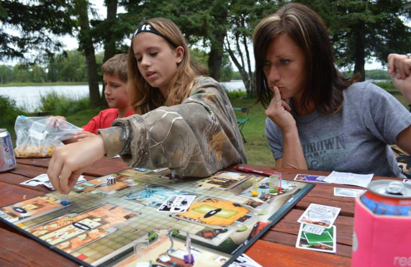 Family game night at Hyde-A-Way Bay Resort.