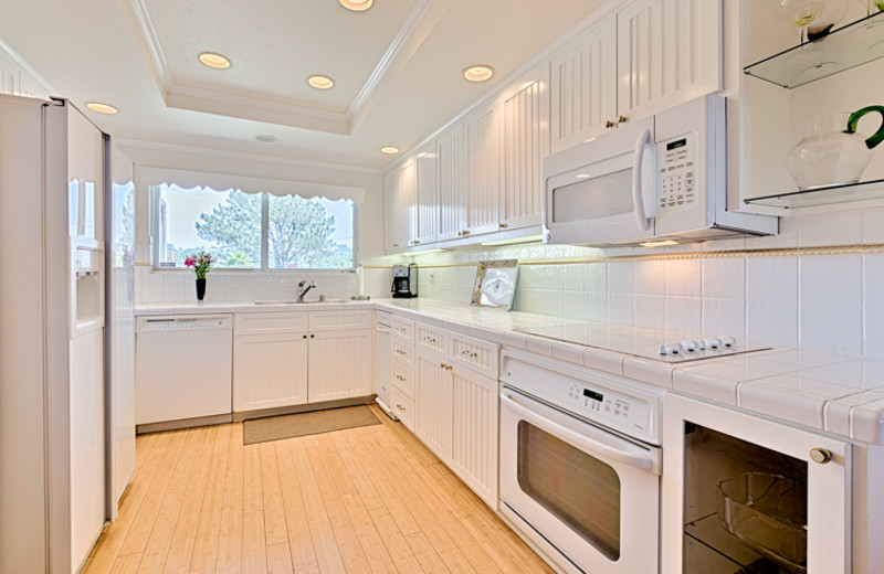 Vacation rental kitchen at Seabreeze Vacation Rentals, LLC.