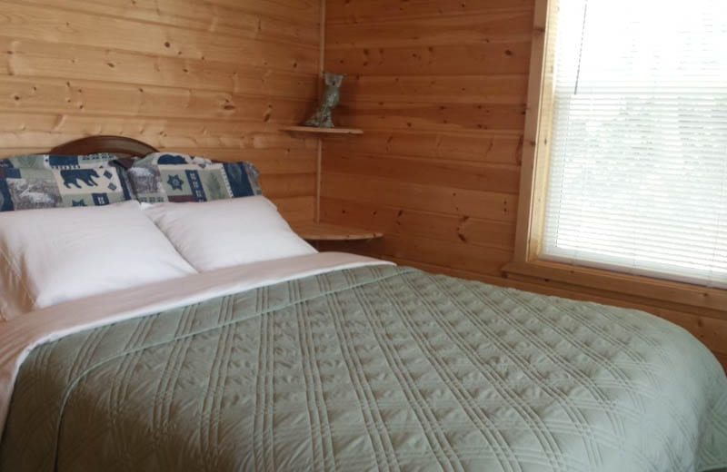 Cabin bedroom at Silver Beach Resort.
