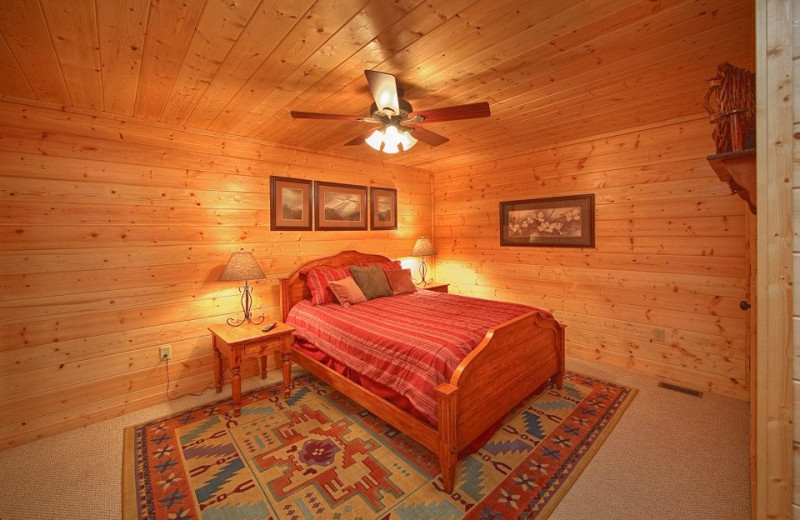 Cabin bedroom at Cabin Fever Vacations.