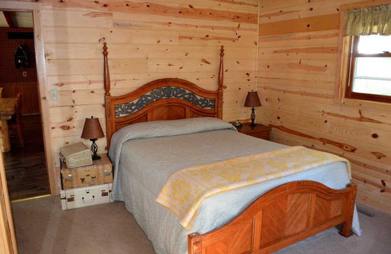 Cabin bedroom at Backroads Inn and Cabins.