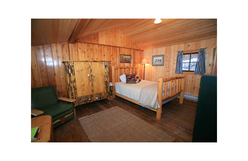 Cabin bedroom at Rimrock Dude Ranch.