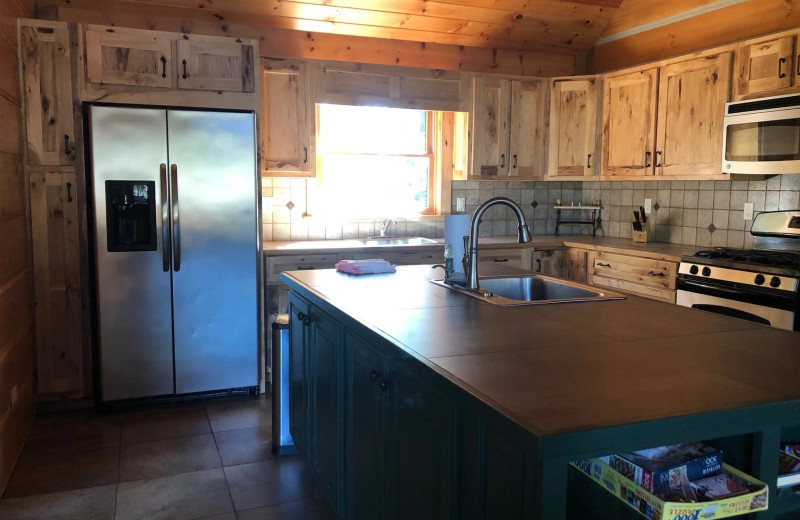 Cabin kitchen at Riverbay Adventure Inn.