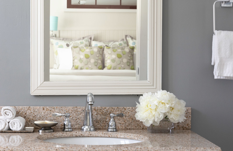 Guest bathroom at Vineyard Square Hotel & Suites.