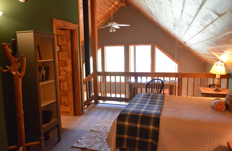 Cabin bedroom at Natapoc Lodging.