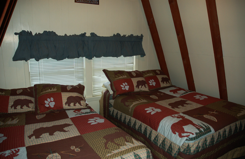 Cabin bedroom at Alpine Lodge Resort.