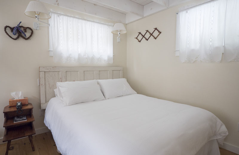 Cottage bedroom at Sunapee Harbor Cottages.