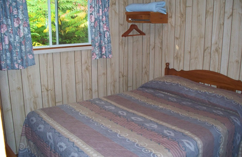 Cabin bedroom at Sandy Lane Resort.