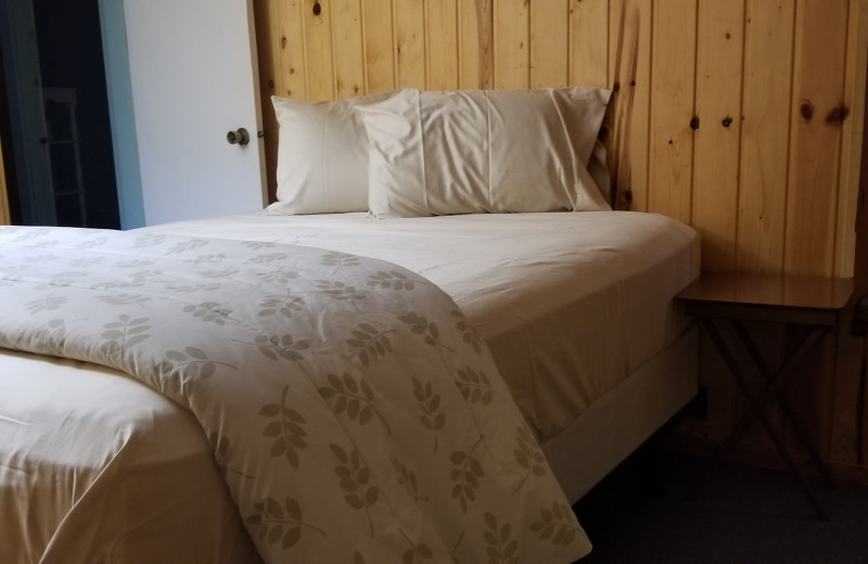 Cabin bedroom at Evergreen Bay Resort.