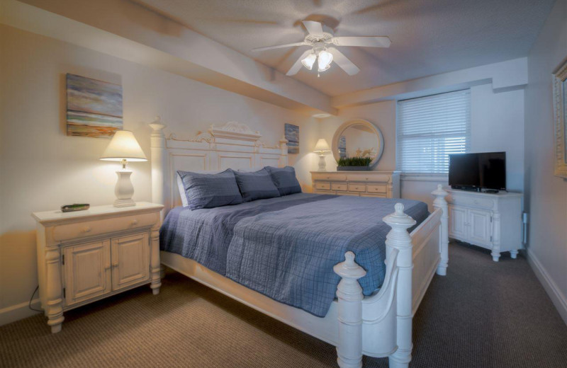 Rental bedroom at CondoLux Vacation Rentals.