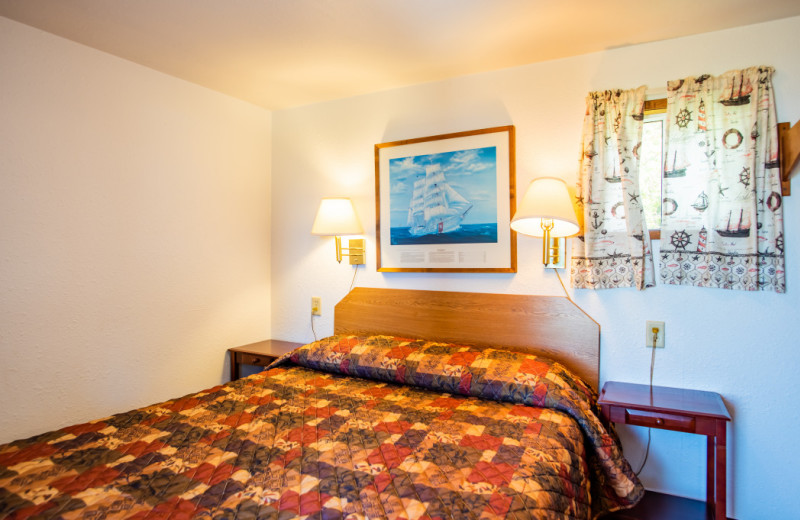 Cabin bedroom at Oceanside Ocean Front Cabins.