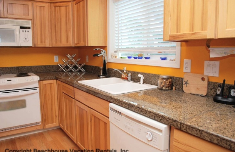 Rental kitchen at Beachhouse Vacation Rentals.