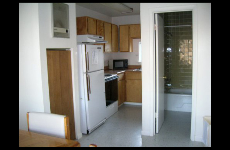 Cabin kitchen and bathroom at Lighthouse Lodge Resort.