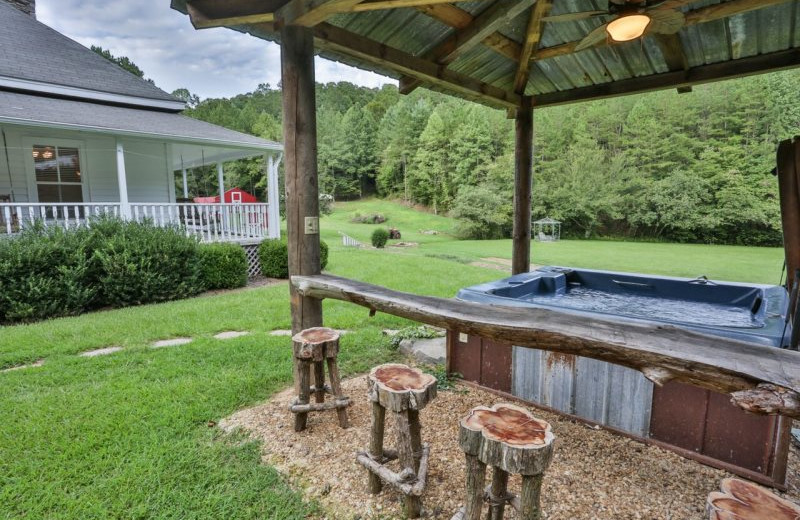 Rental hot tub at Blue Sky Cabin Rentals.