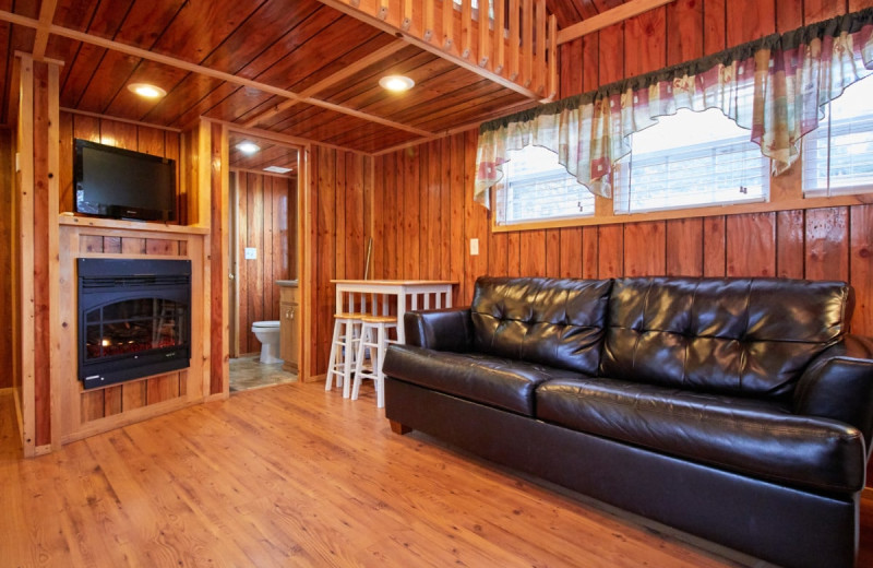 Cabin living room at Yogi Bear's Jellystone Park Warrens.