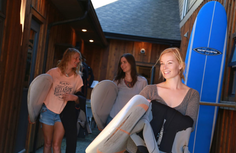 Surfers at Long Beach Lodge Resort.