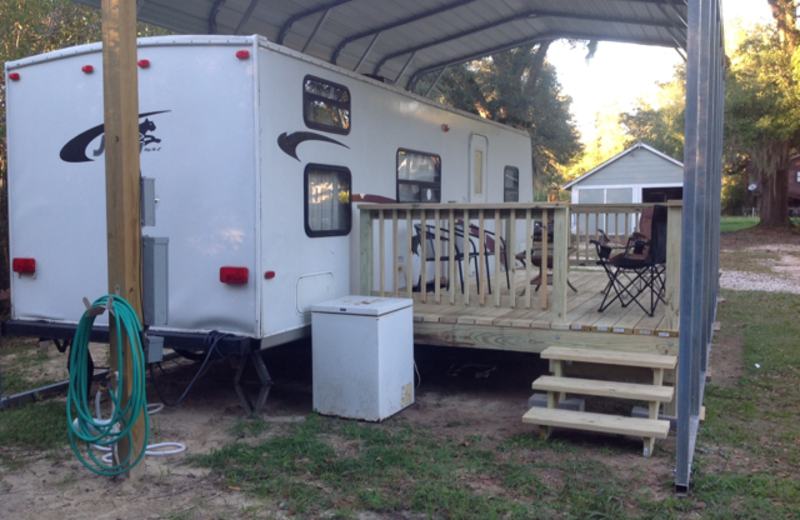 Camper exterior deck at Berry Creek, LLC - Tailgate Camper.