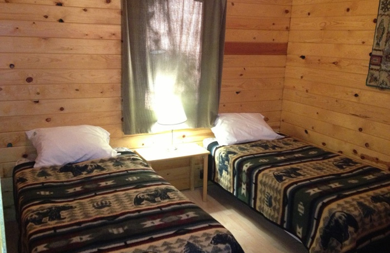 Cabin bedroom at Cedar Point Resort.