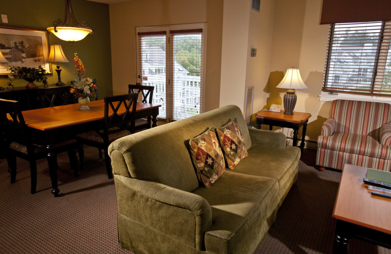 Guest dining and living room at Holiday Inn Club Vacations at Ascutney Mountain Resort.