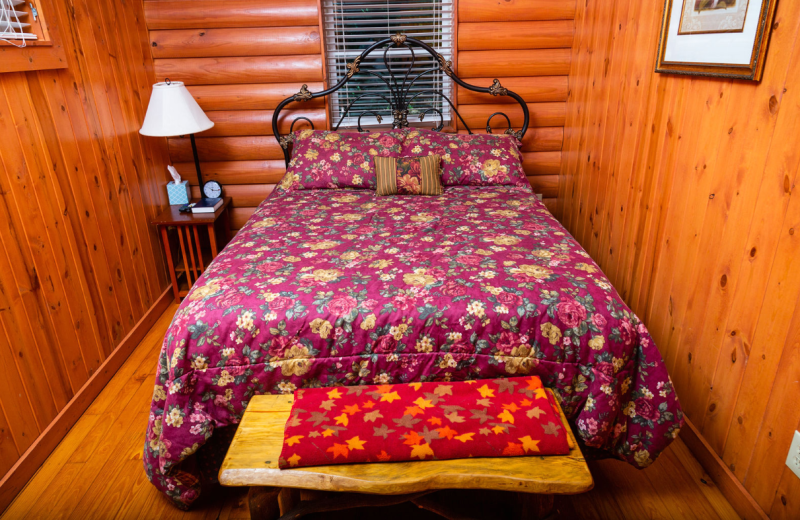 Cabin bedroom at Mountain Aire Cottages