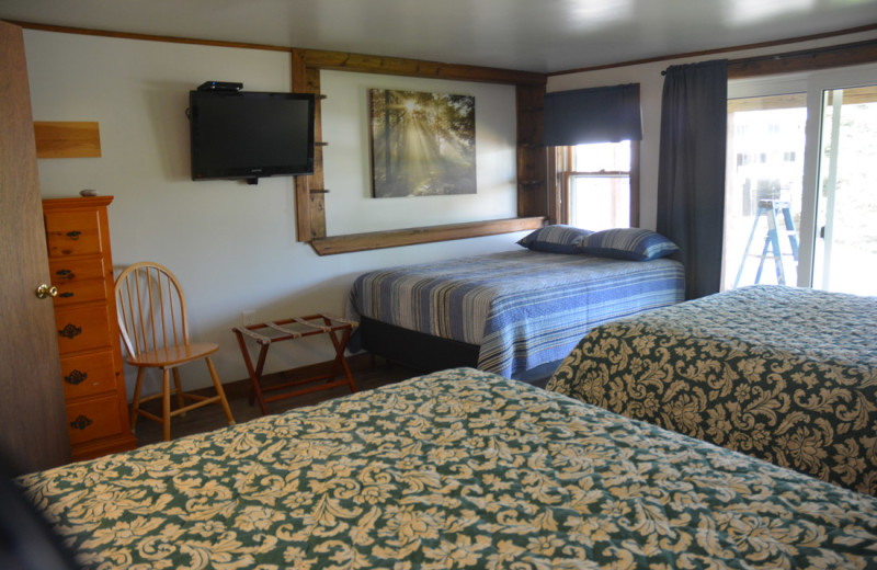 Cottage bedroom at Channel Waterfront Cottages.