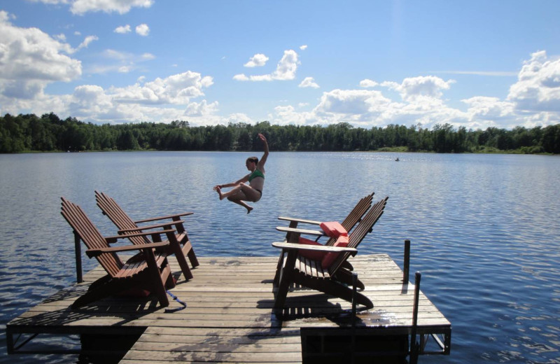 Jumping off dock at Delta Lodge.