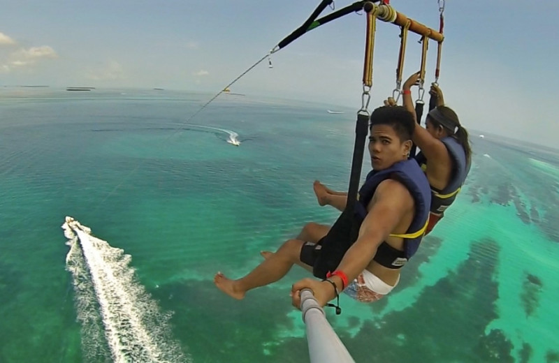 Every hou, all day, the parasailing boats go out!