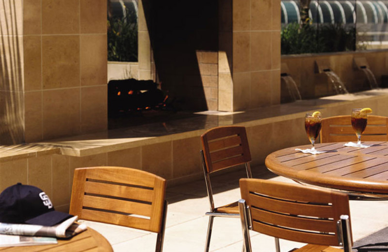 Outdoor dining on Palm Terrace at Omni San Diego Hotel.