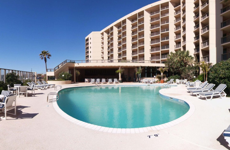 Outdoor pool at The Dunes Condominiums.