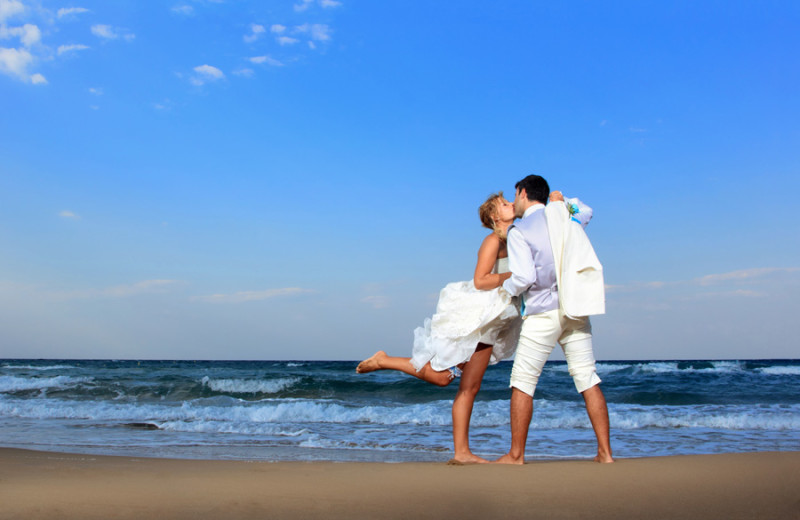 Wedding on the beach at Beacher's Lodge Oceanfront Suites.