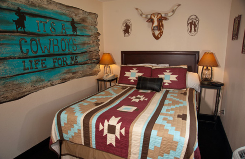 Guest bedroom at The Branson Stone Castle Hotel & Conference Center.