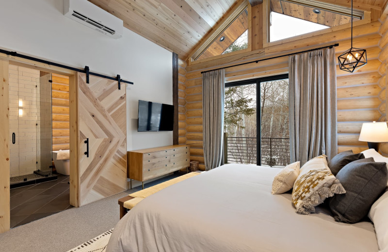 Cabin bedroom at Teton Springs Lodge.