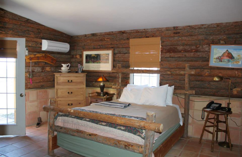 Cabin bedroom at Colorado Cattle Company Ranch.