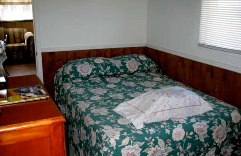 Cabin bedroom at Brennan Harbour Resort.