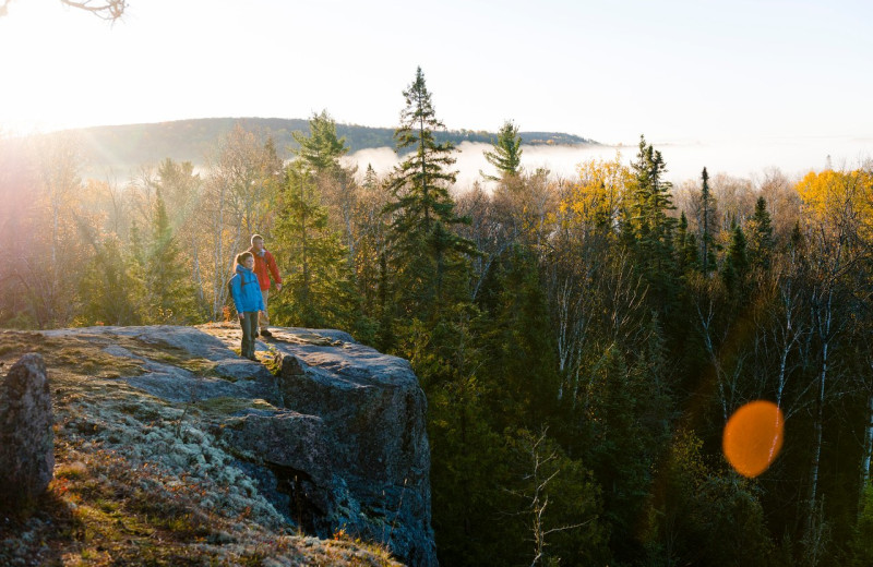 Couple hiking at Algonquin Log Cabin.