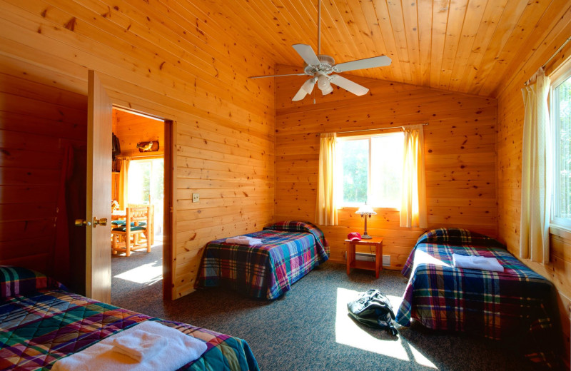 Cabin bedroom at Tetu Island Lodge.