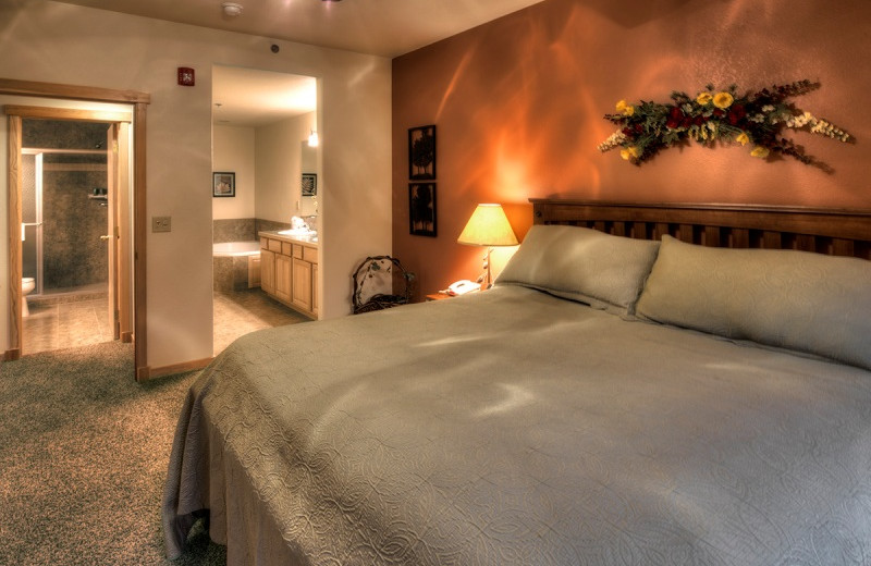Guest bedroom at Grand Timber Lodge.