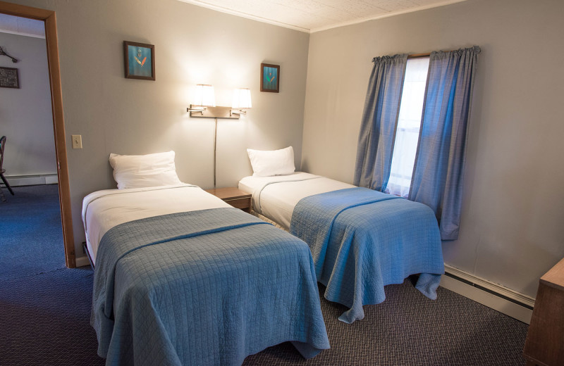 Cabin bedroom at Dunham's Bay Resort.