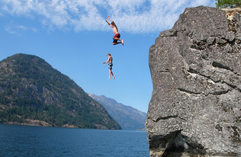 Jumping into lake at Campbell's Resort on Lake Chelan.