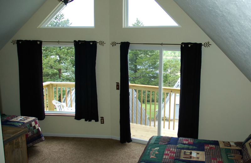 Cabin bedroom at Alpine Lodge Resort.